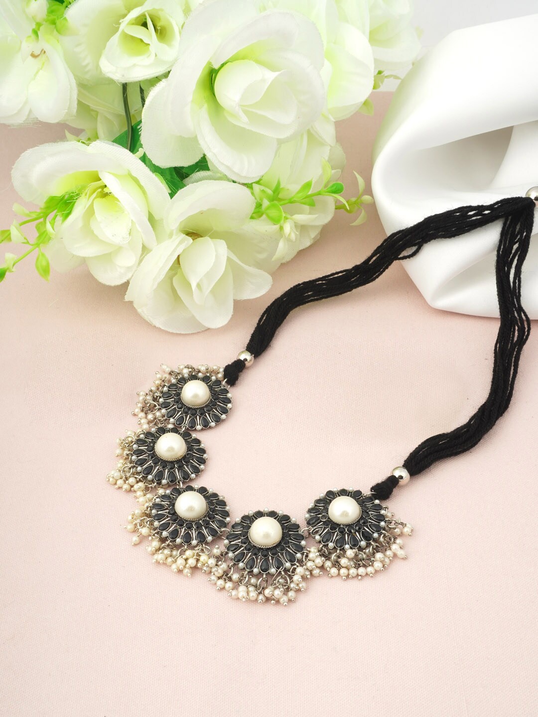 

Urmika Women Black Necklace and Chains