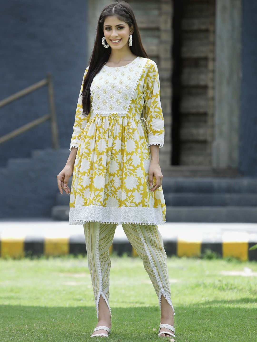 

Juniper Women Yellow Ethnic Motifs Pleated Kurti with Dhoti Pants & With Dupatta