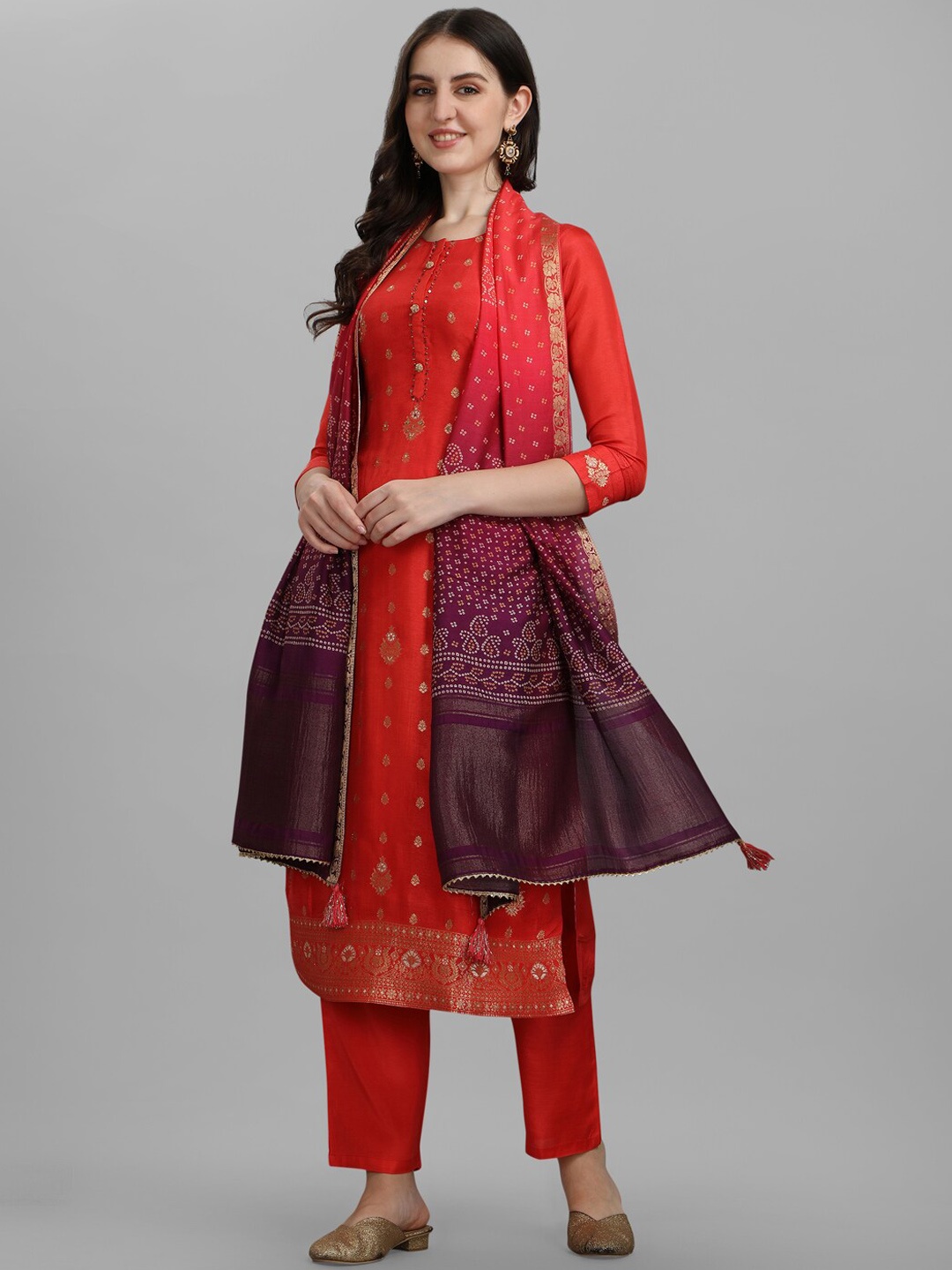 

Seerat Women Orange Embroidered Jacquard Silk Kurti with Palazzos