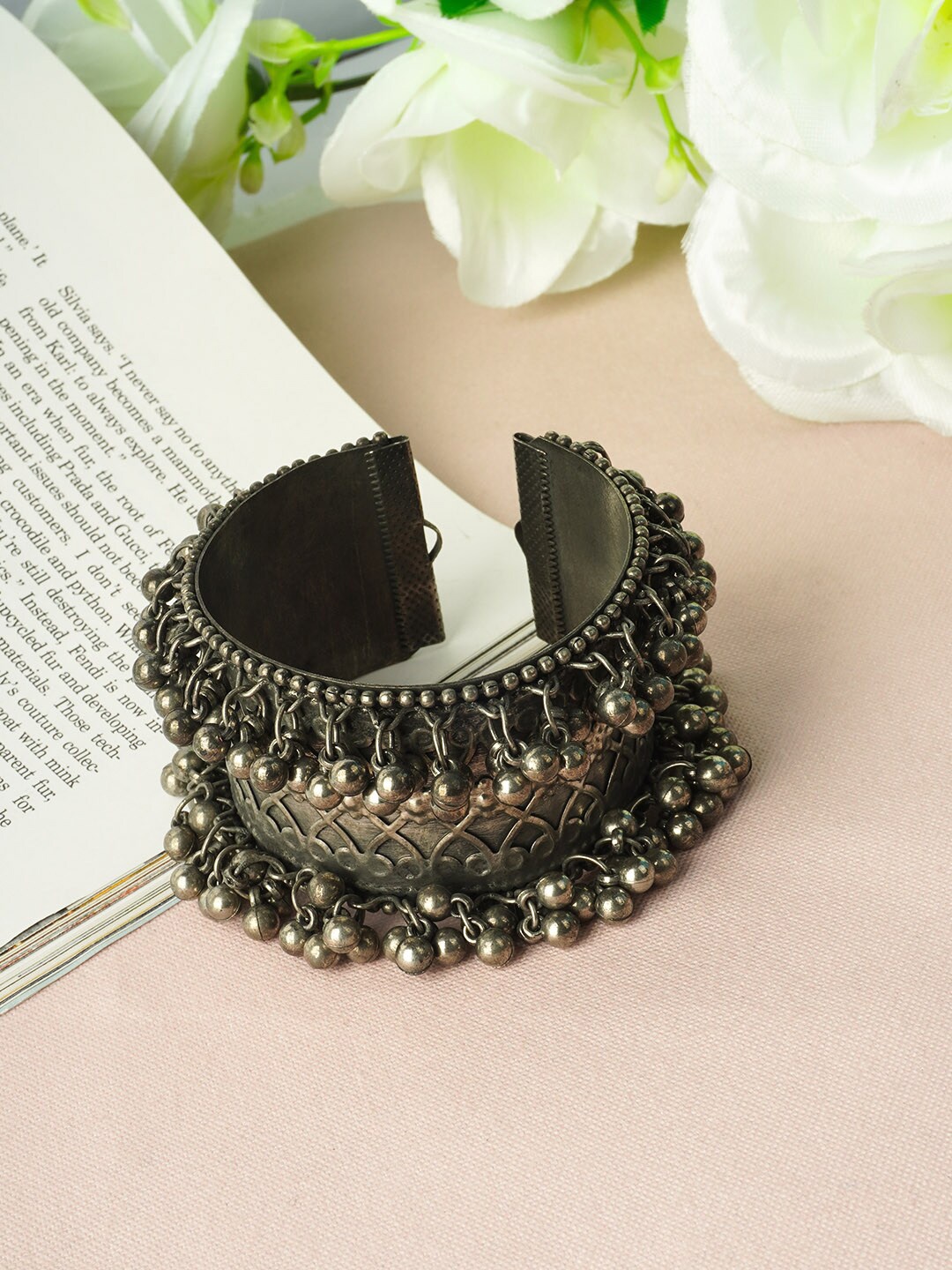 

Urmika Women Silver-Toned Cuff Bracelet
