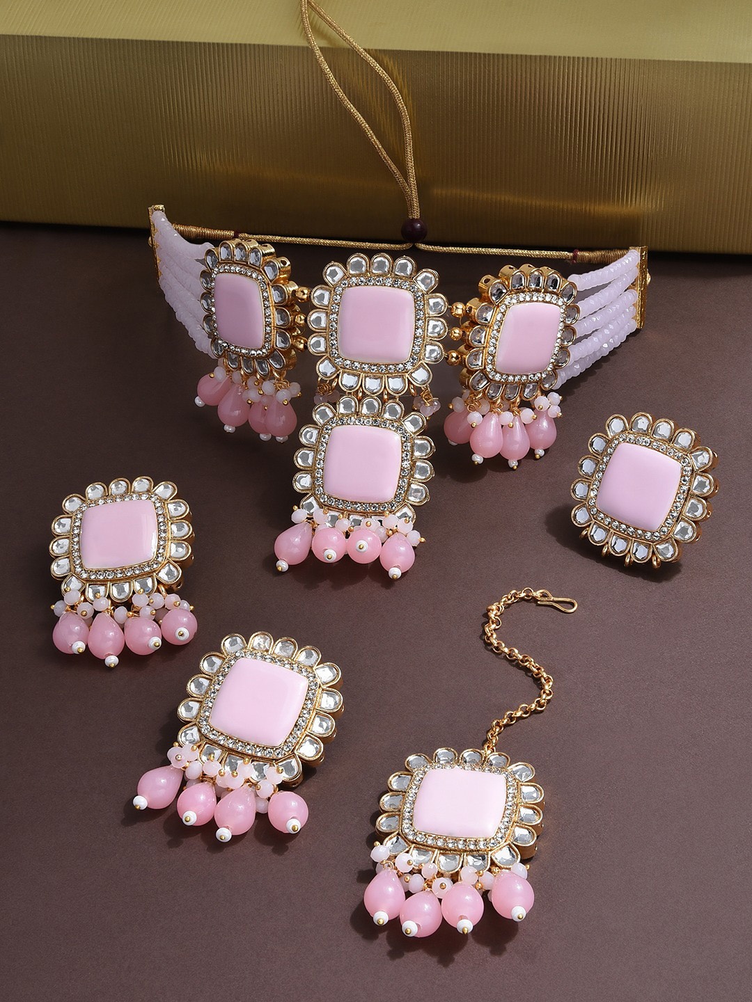 

Zaveri Pearls Gold-Plated Pink Stone Studded & Beaded Jewellery Set