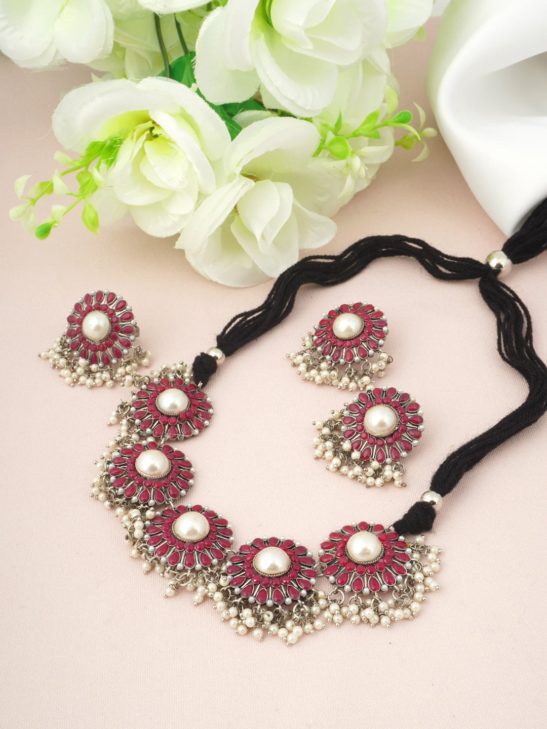 

Urmika Silver-Plated Red & White Stone Studded & Beaded Jewellery Set