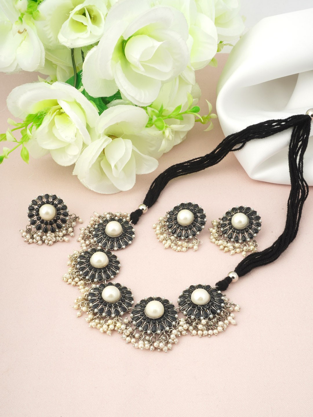 

Urmika Silver-Toned White Stone-Studded Beaded Jewellery Set, Black