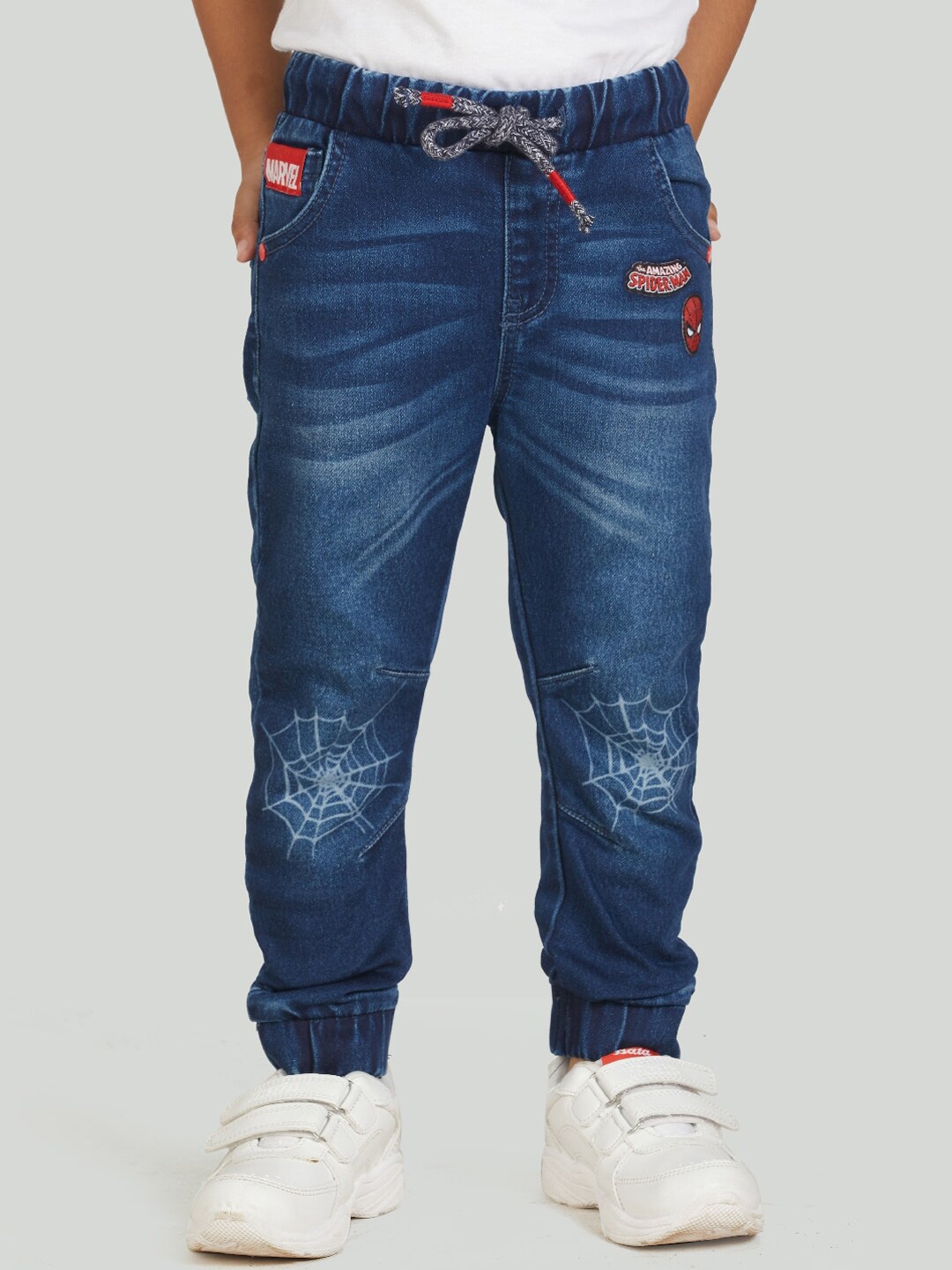 

Zalio Boys Blue Spiderman Jogger Mildly Distressed Light Fade Printed Jeans