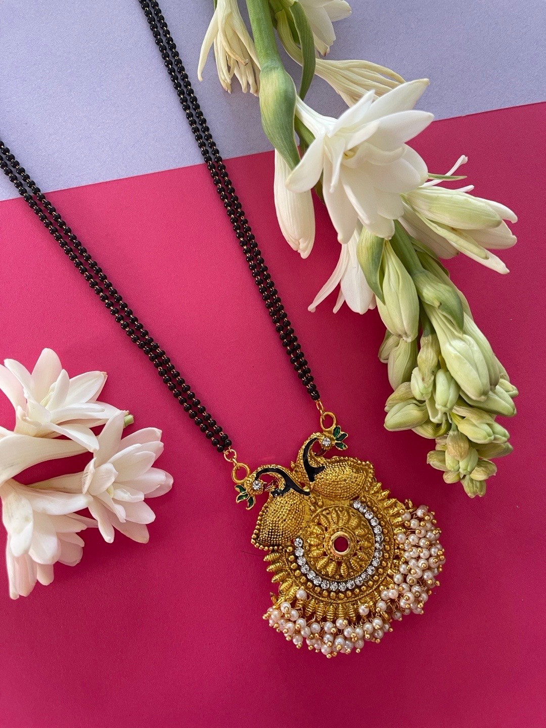 

Digital Dress Room Women Multi-Colored Gold-Plated Artificial Stone & Beads Studded Mangalsutra