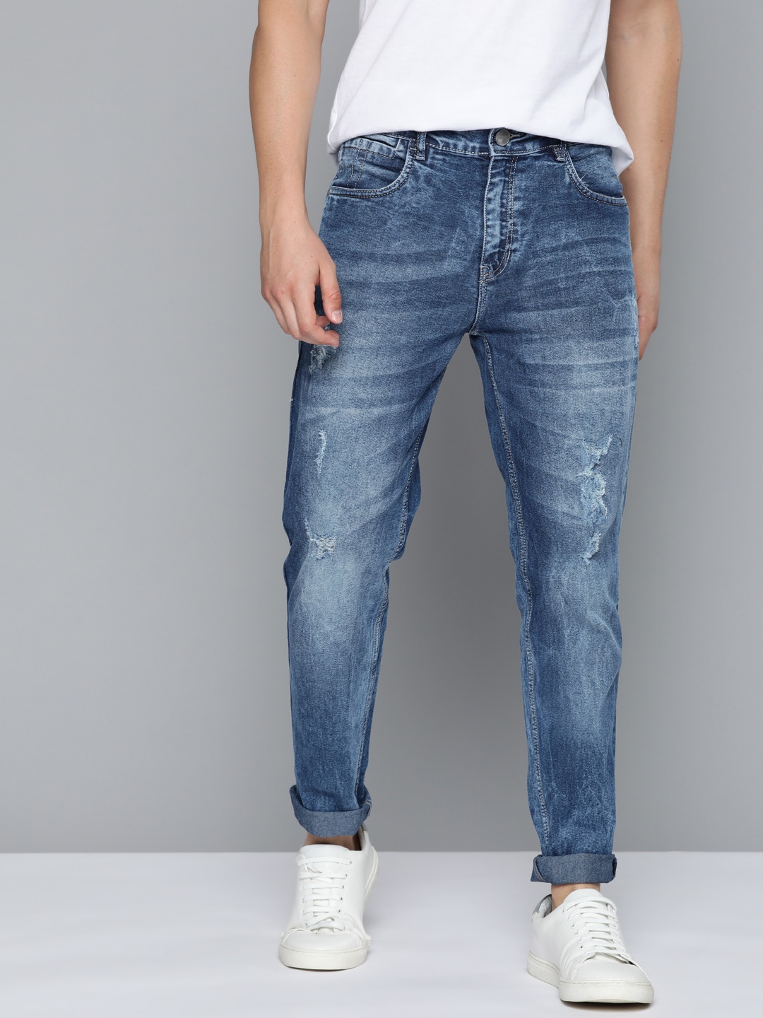 

Mast & Harbour Men Blue Carrot Fit Mildly Distressed Light Fade Acid Wash Jeans