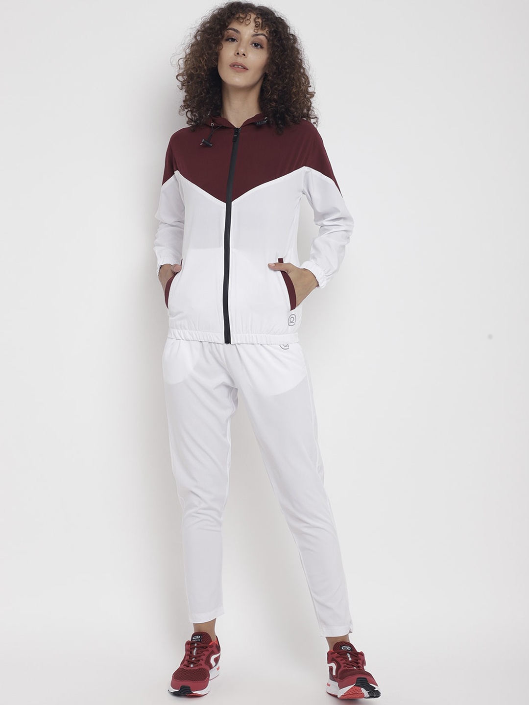 

Chkokko Women Wine Red & White Solid Tracksuits, Maroon