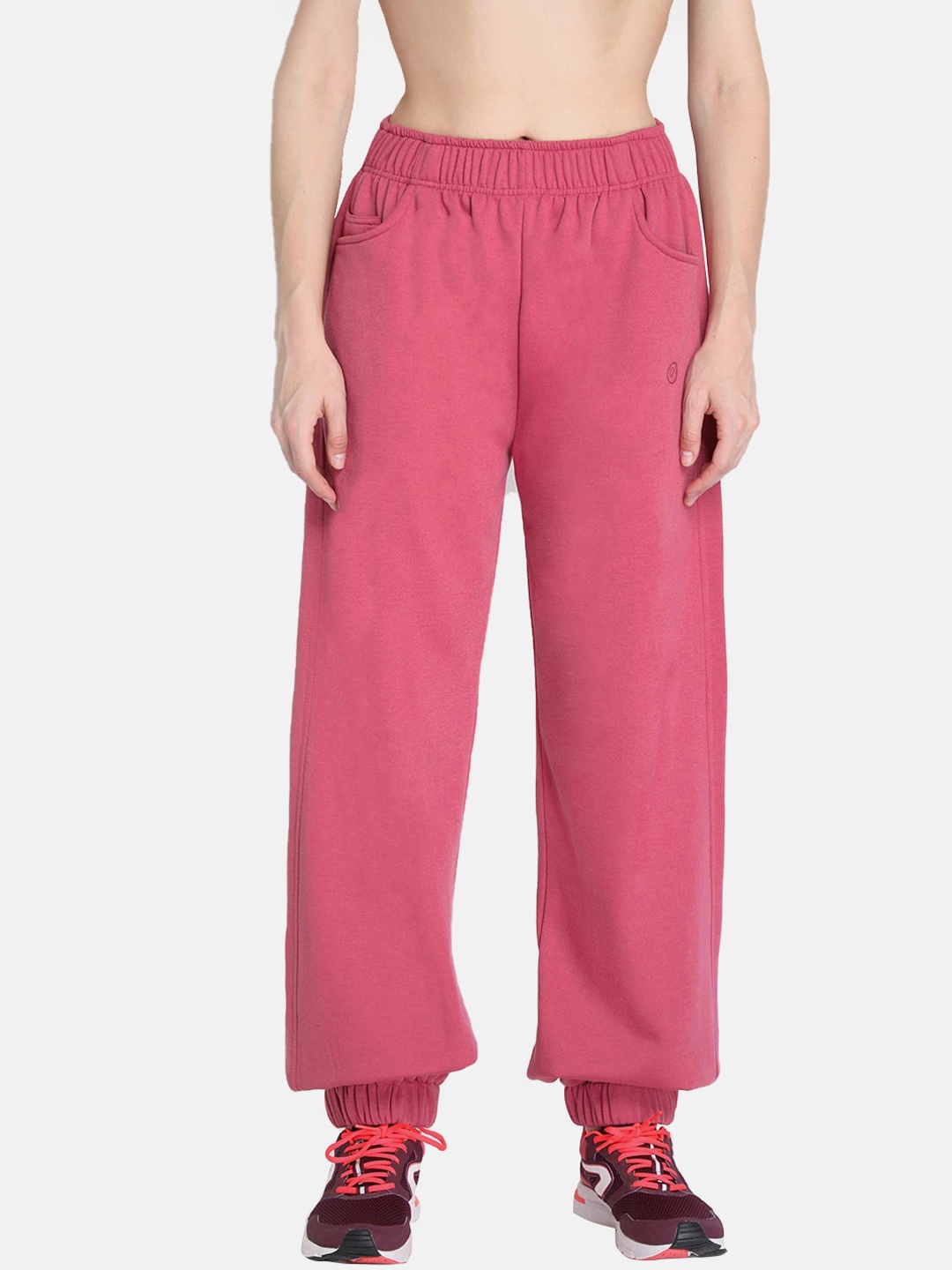 

CHKOKKO Women Peach Solid Track Pants