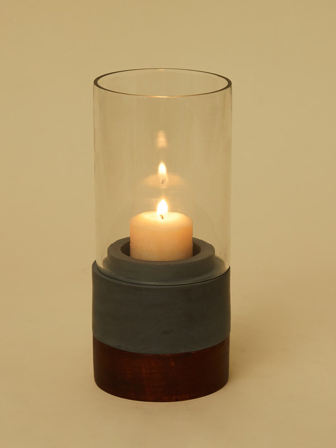 

Home Centre Grey Candle Holder