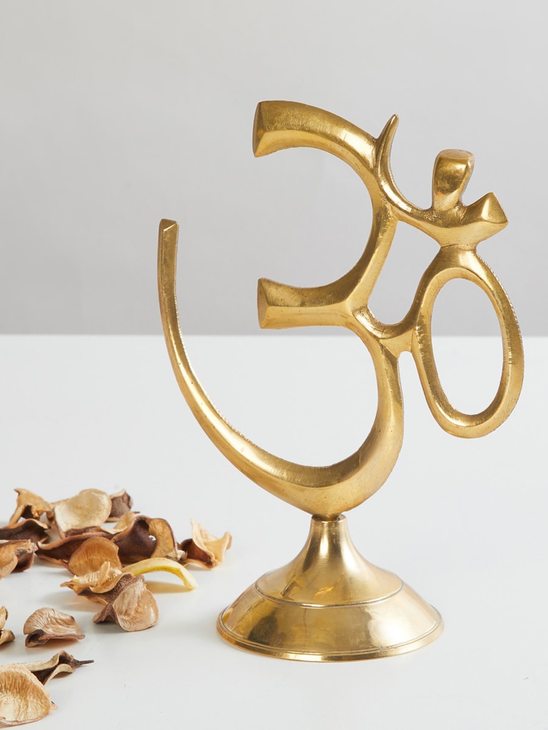 

Home Centre Gold-Toned Antique Om Figurine