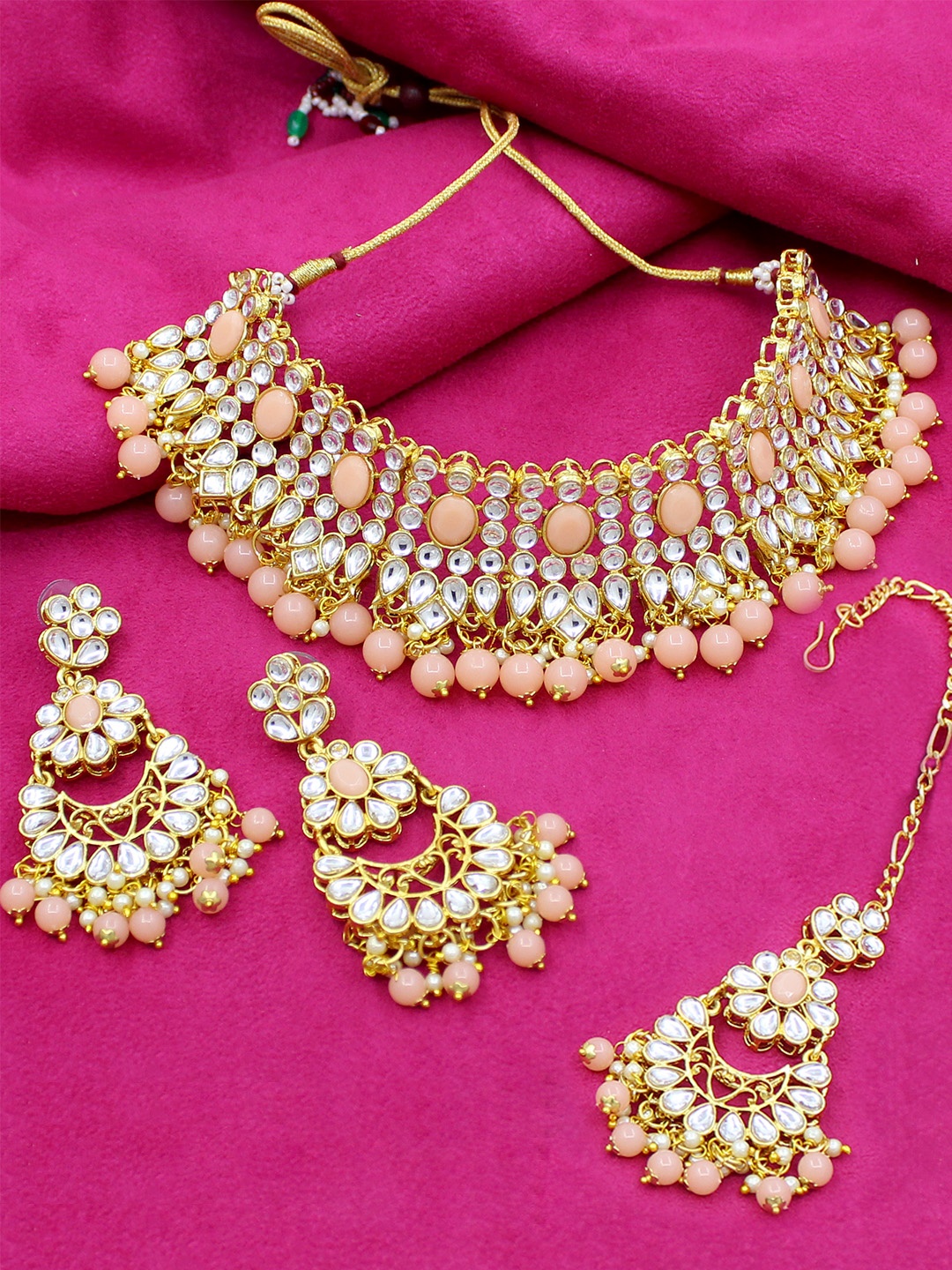 

SAIYONI Gold-Plated White & Peach-Coloured Kundan-Studded & Pearl Beaded Jewellery Set