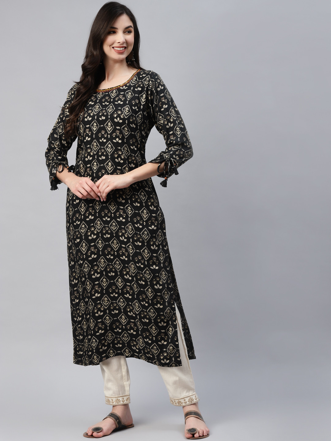 

Aarika Women Black & Beige Ethnic Motifs Printed Kurta