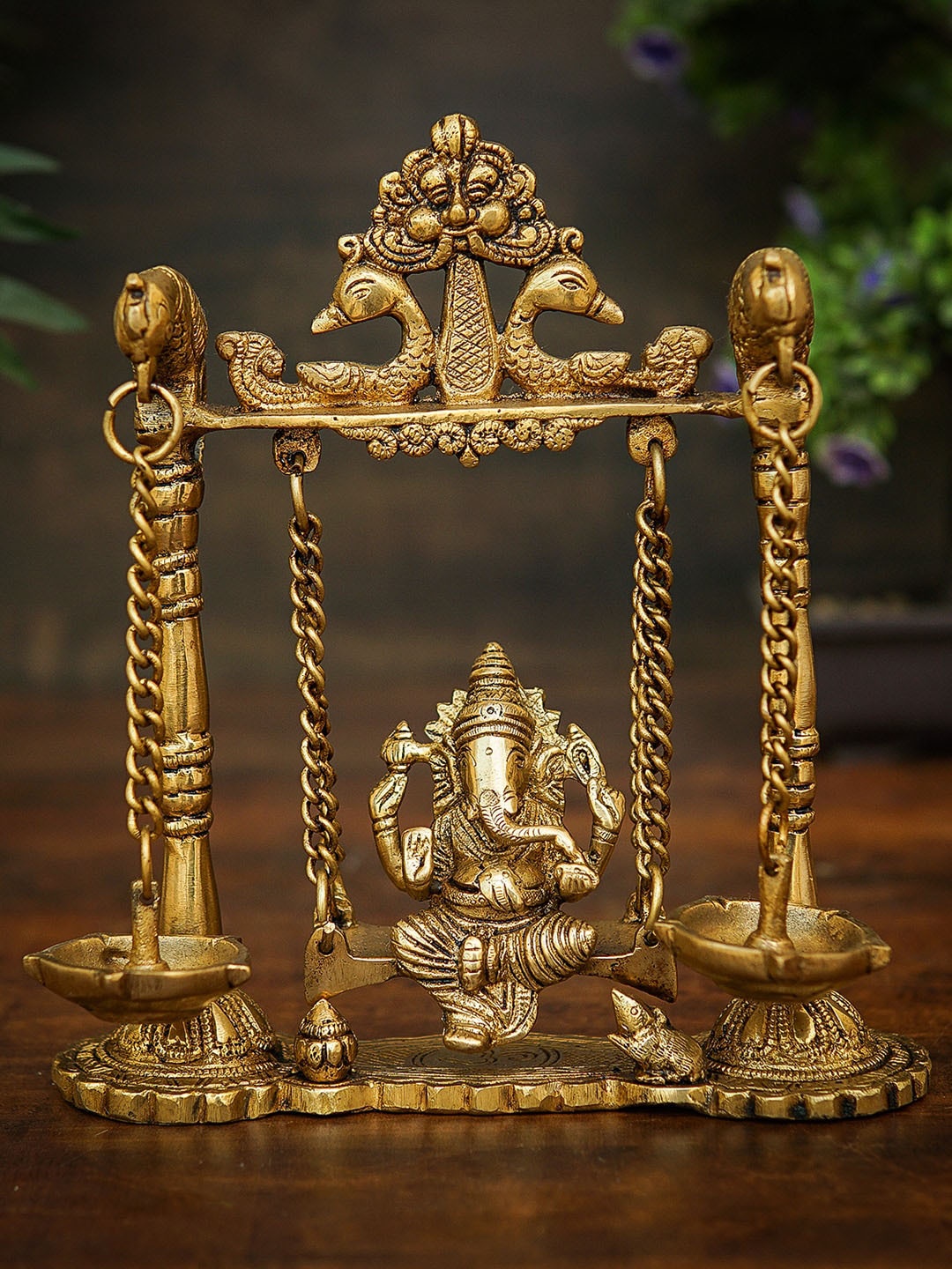 

StatueStudio Gold Toned Ganesha Idol On Jhula Swing Brass Showpieces