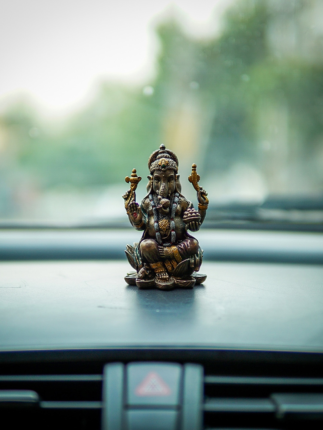 

StatueStudio Bronze-Toned Ganesha Idol Sitting On Lotus Showpieces, Gold