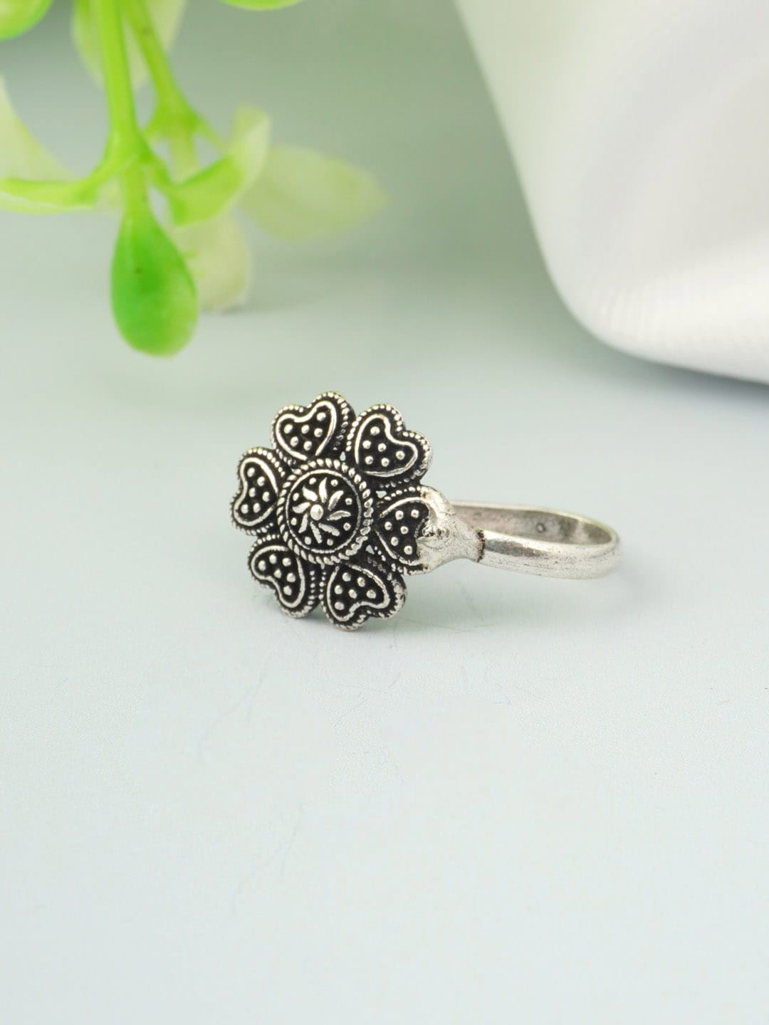 

Urmika Oxidised Silver-Toned Clip-On Nose Pin