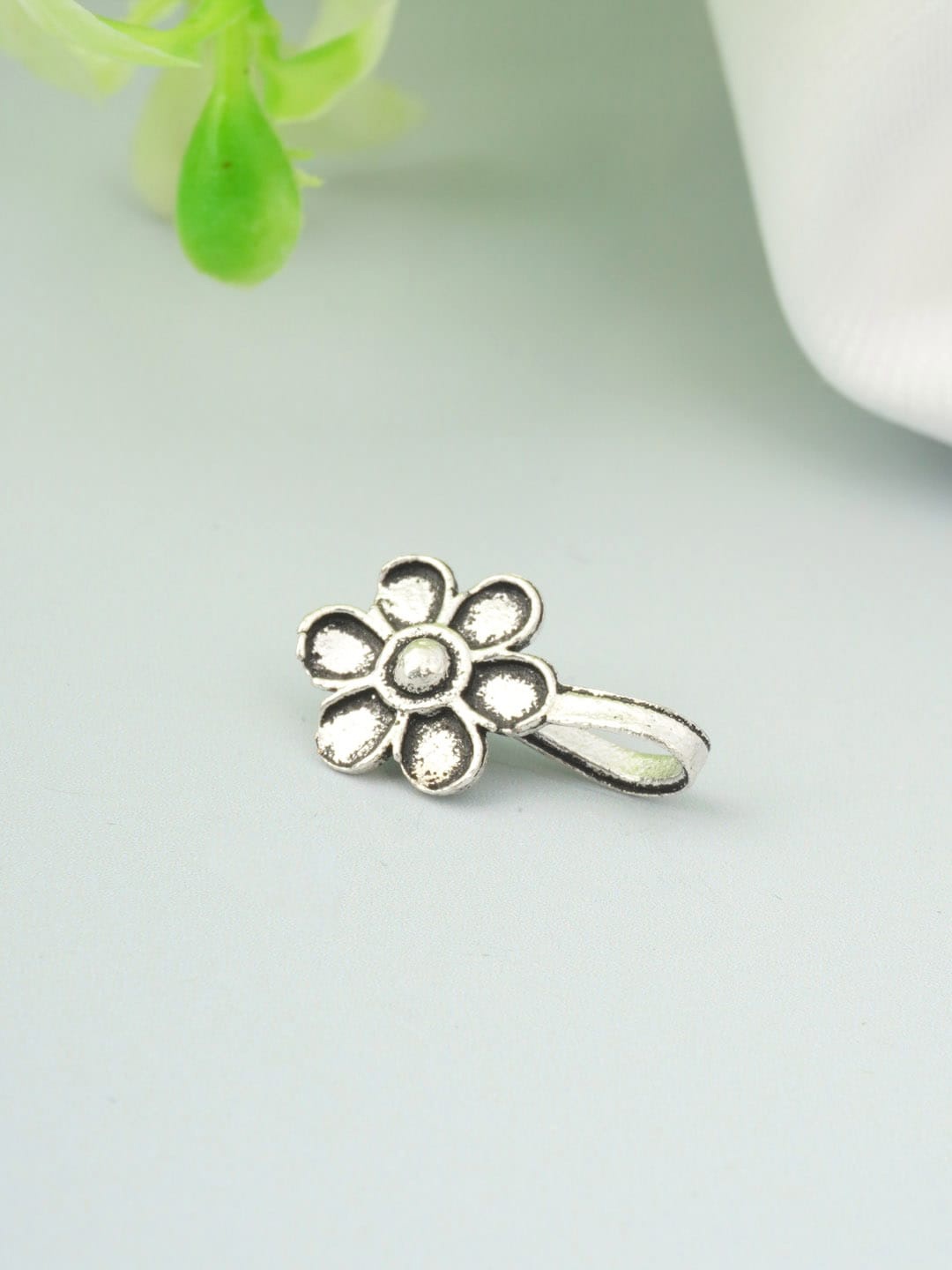 

Urmika Silver-Toned Ethnic Oxidized Nose Ring