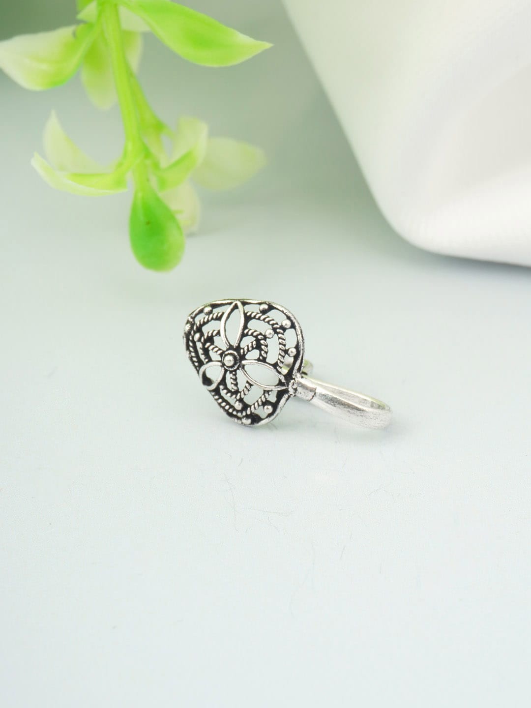 

Urmika Silver Plated Oxidised Nose Ring