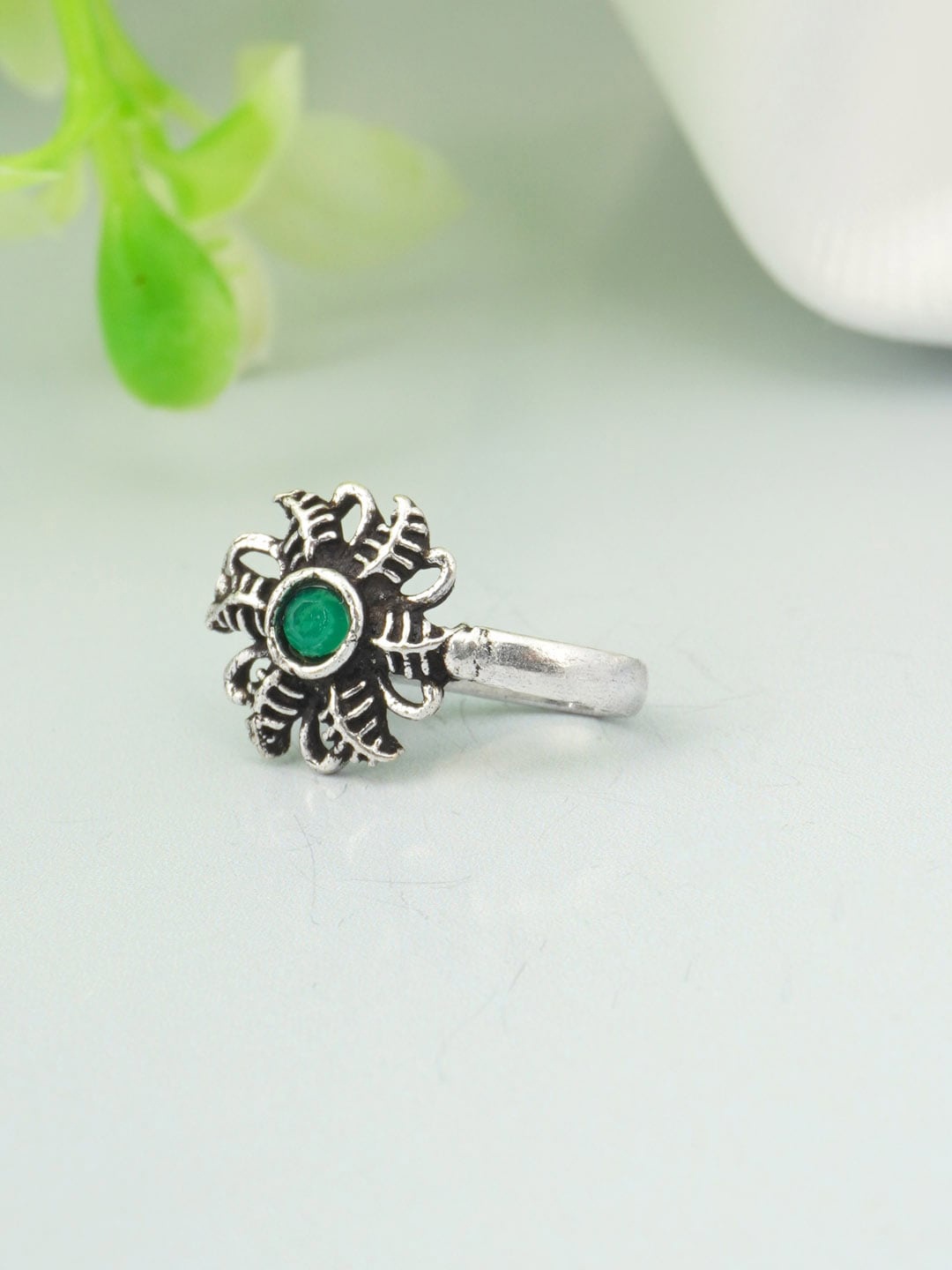 

Urmika Silver-Toned Green Ethnic Oxidised Nosepin