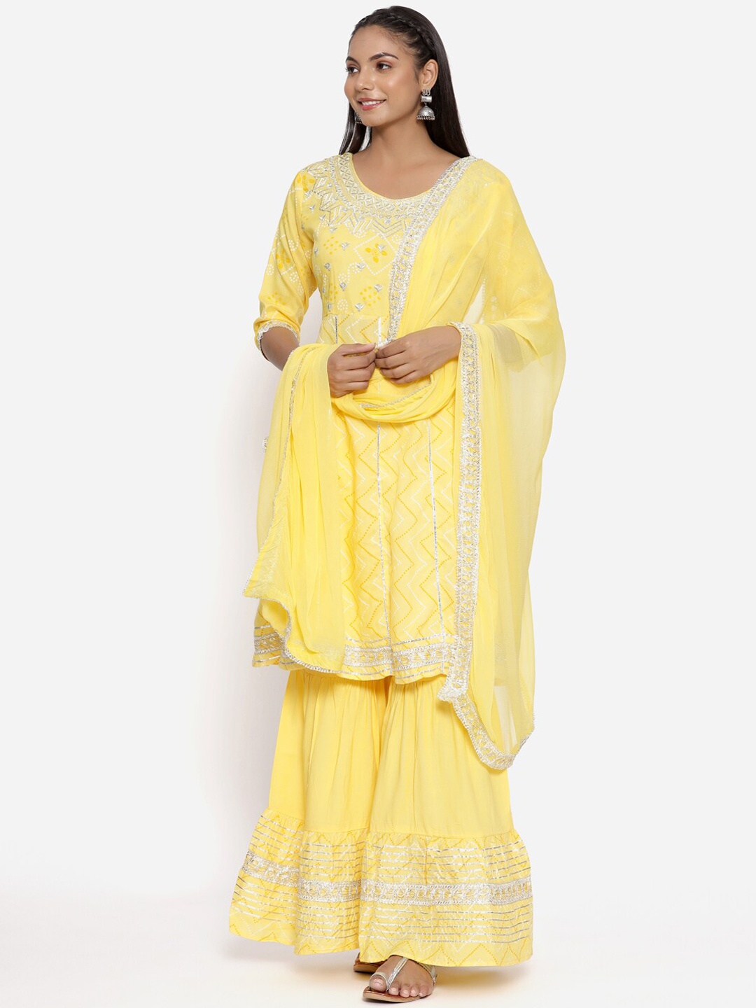 

UNISETS Women Yellow Ethnic Motifs Embroidered Layered Kurta with Sharara & With Dupatta