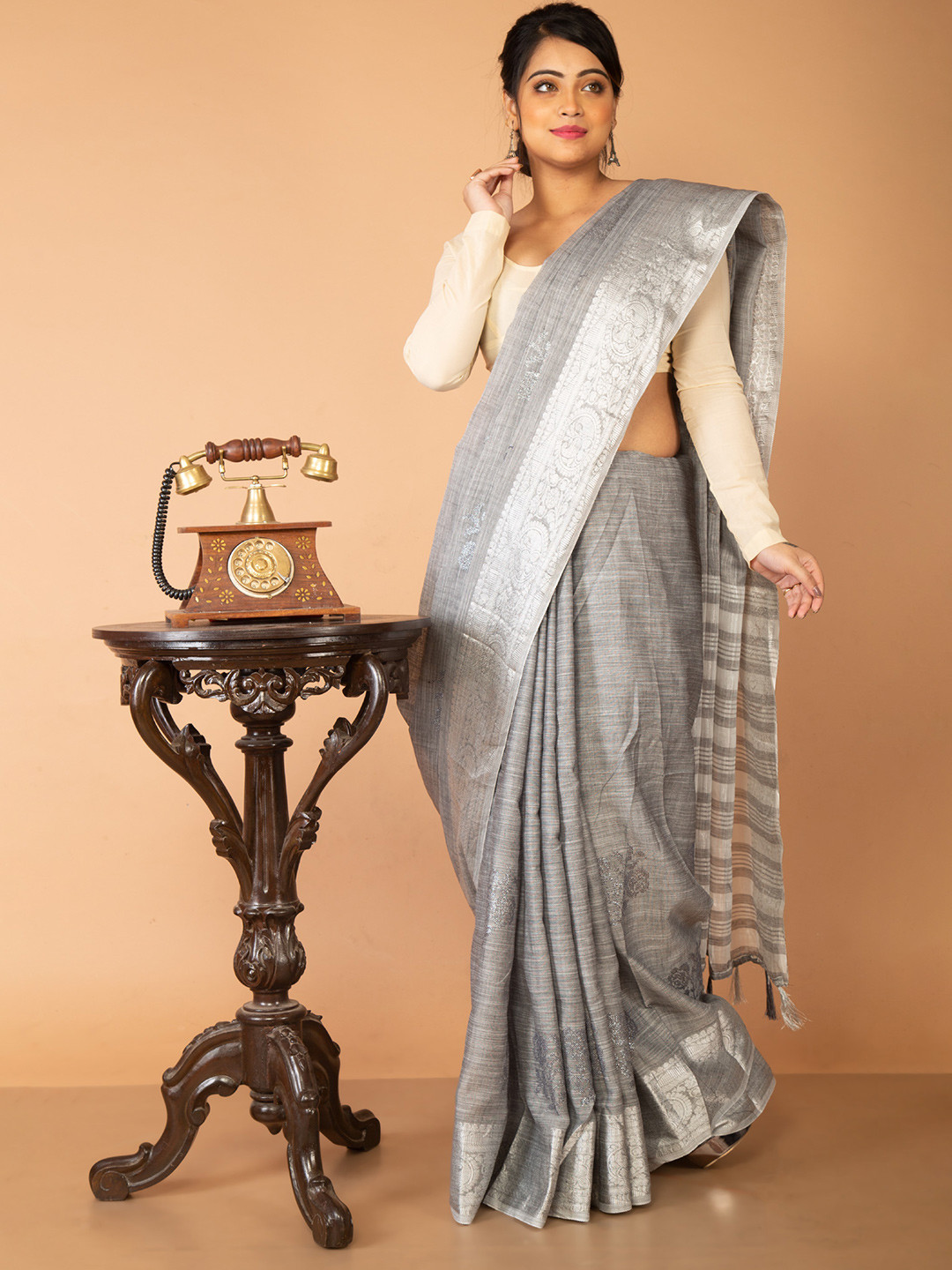 

Unnati Silks Women Grey Sarees