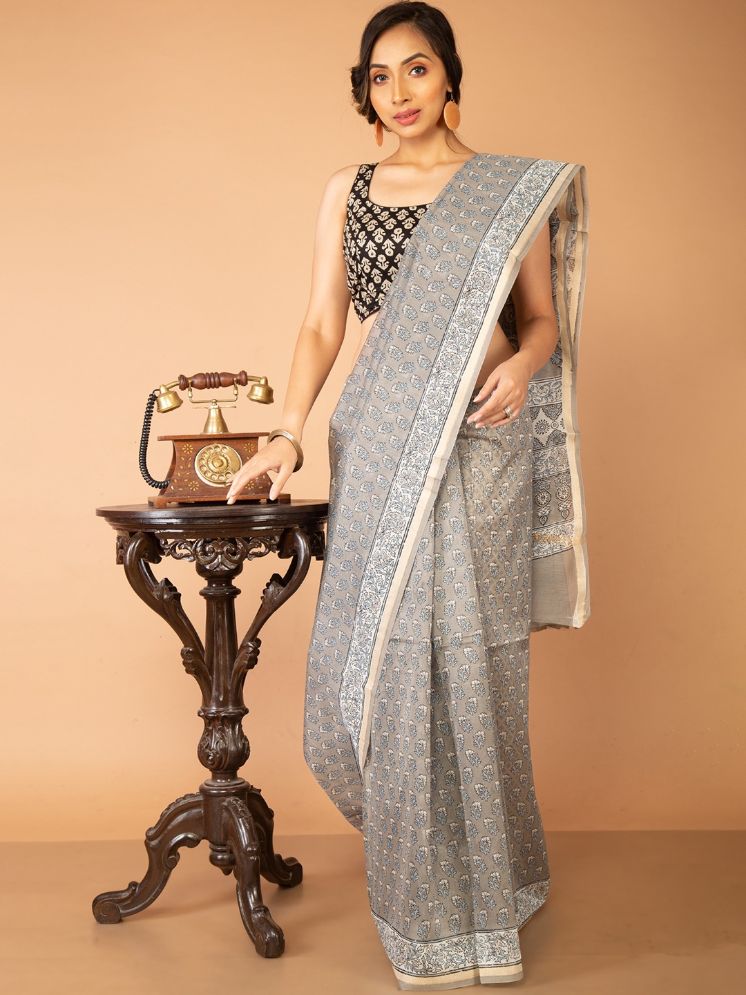 

Unnati Silks Women Grey Sarees