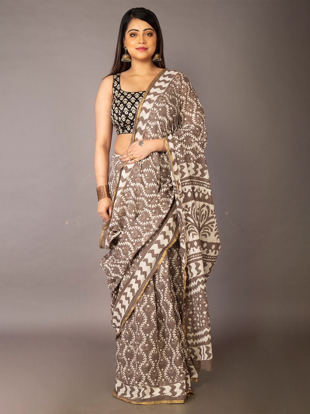 

Unnati Silks Women Grey Sarees