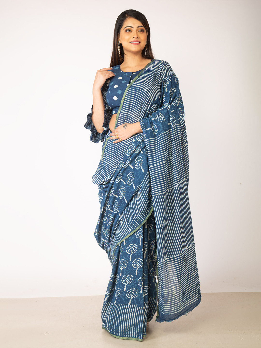 

Unnati Silks Women Navy Blue Sarees