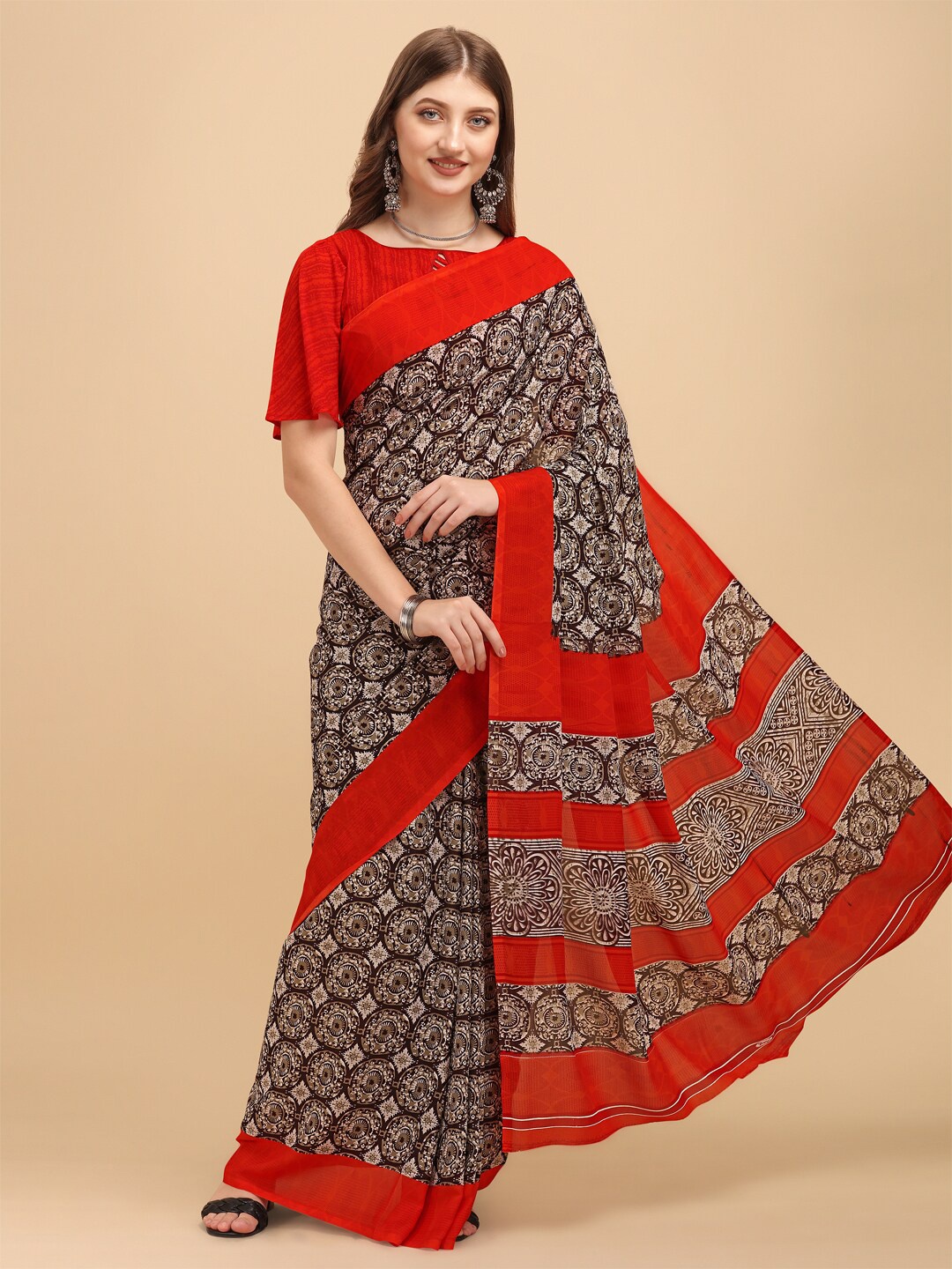 

Sangria Brown & Red Ethnic Motifs Saree