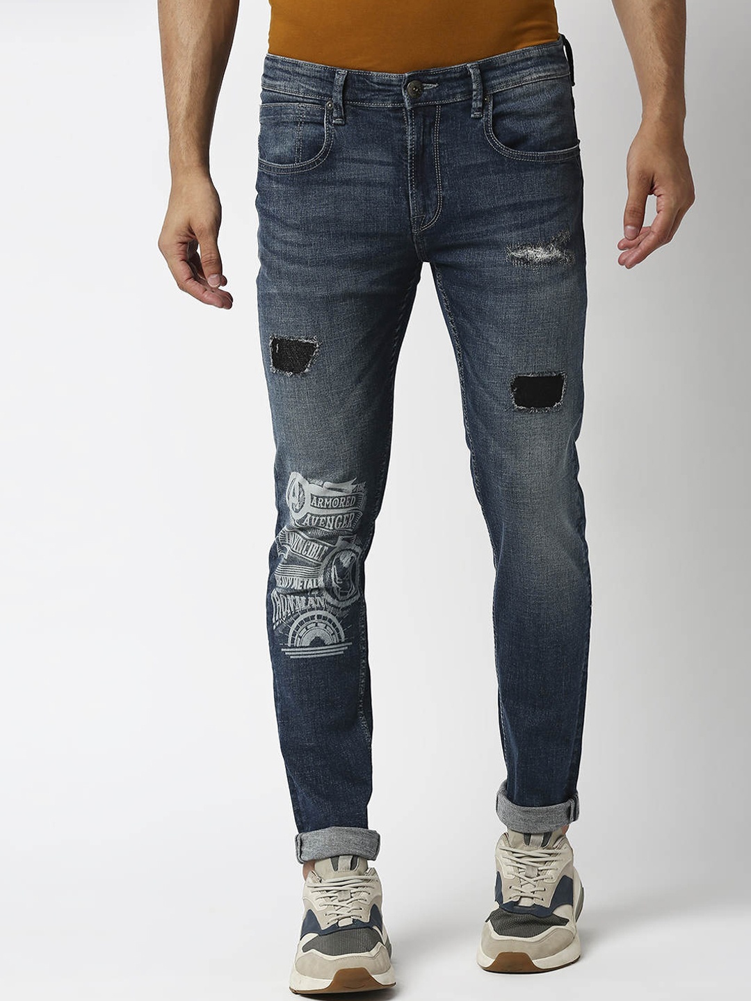 

Pepe Jeans Men Tapered Fit Low-Rise Mildly Distressed Heavy Fade Jeans, Blue