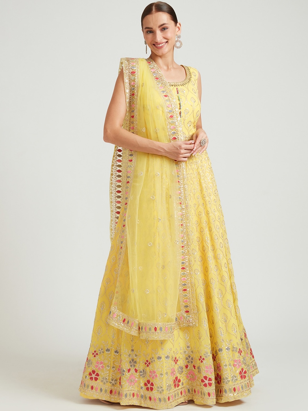 

Neerus Women Yellow Ethnic Motifs Thread Work Kurta With Dupatta