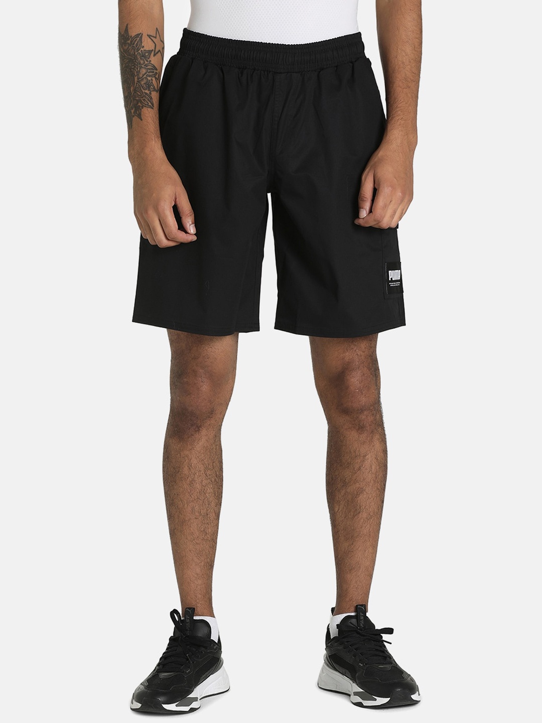 

Puma Men Black Solid SUMMER COURT Regular Fit Sports Shorts