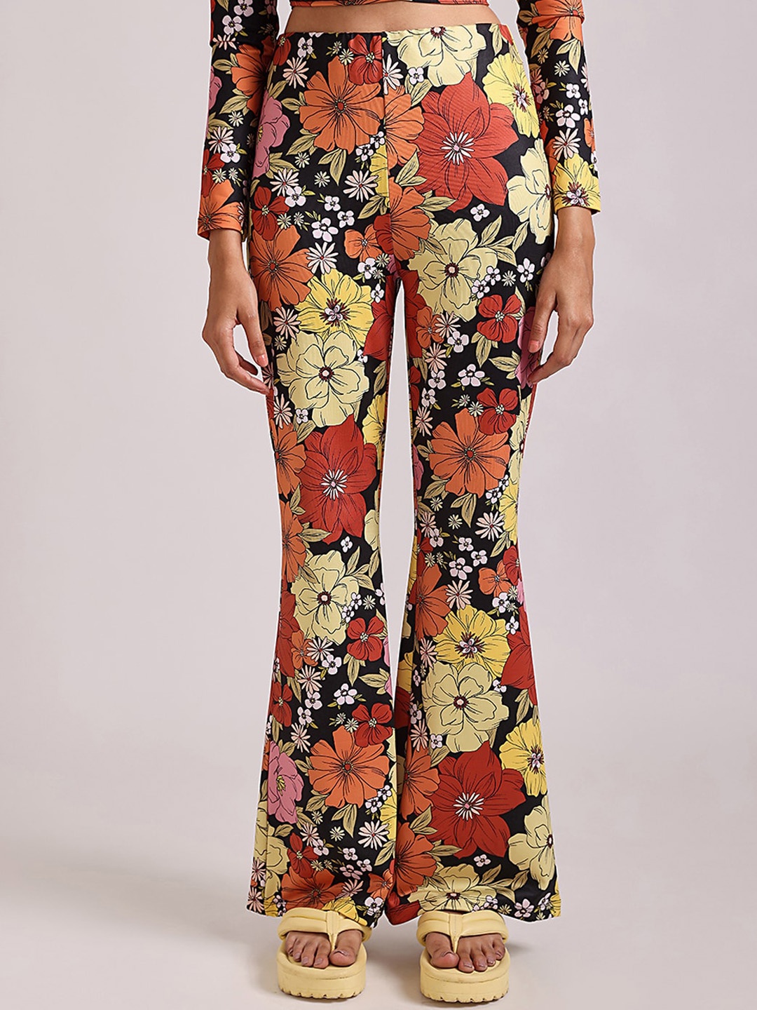 

COVER STORY Women Orange Floral Printed Smart Flared Trousers