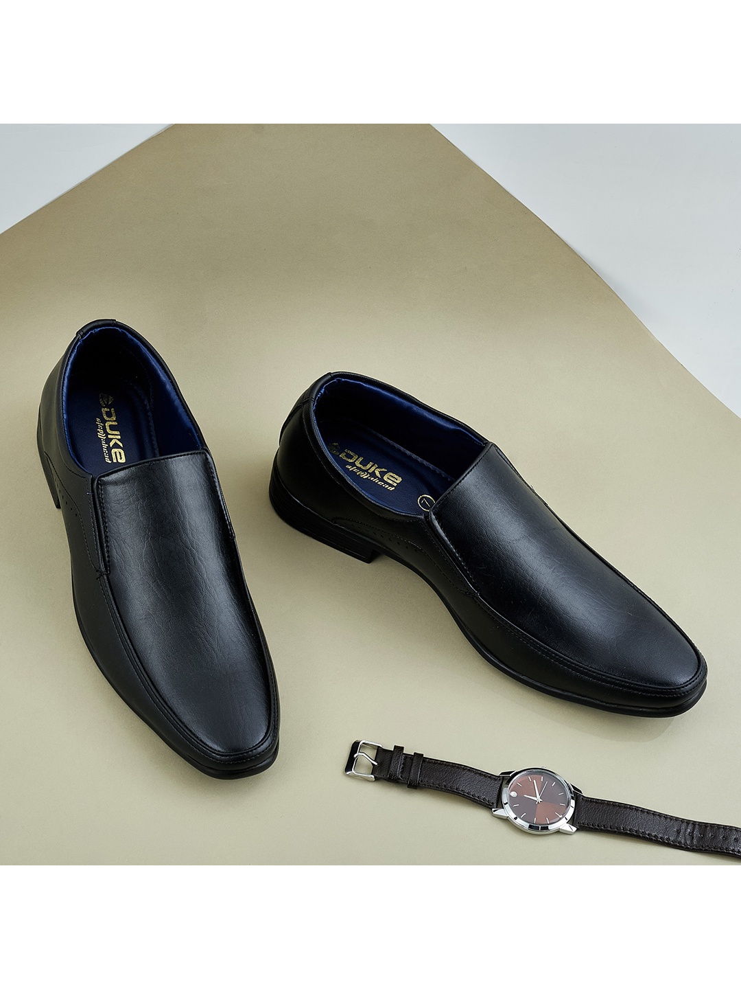 

Duke Men Black Solid Slip-On Formal Shoes