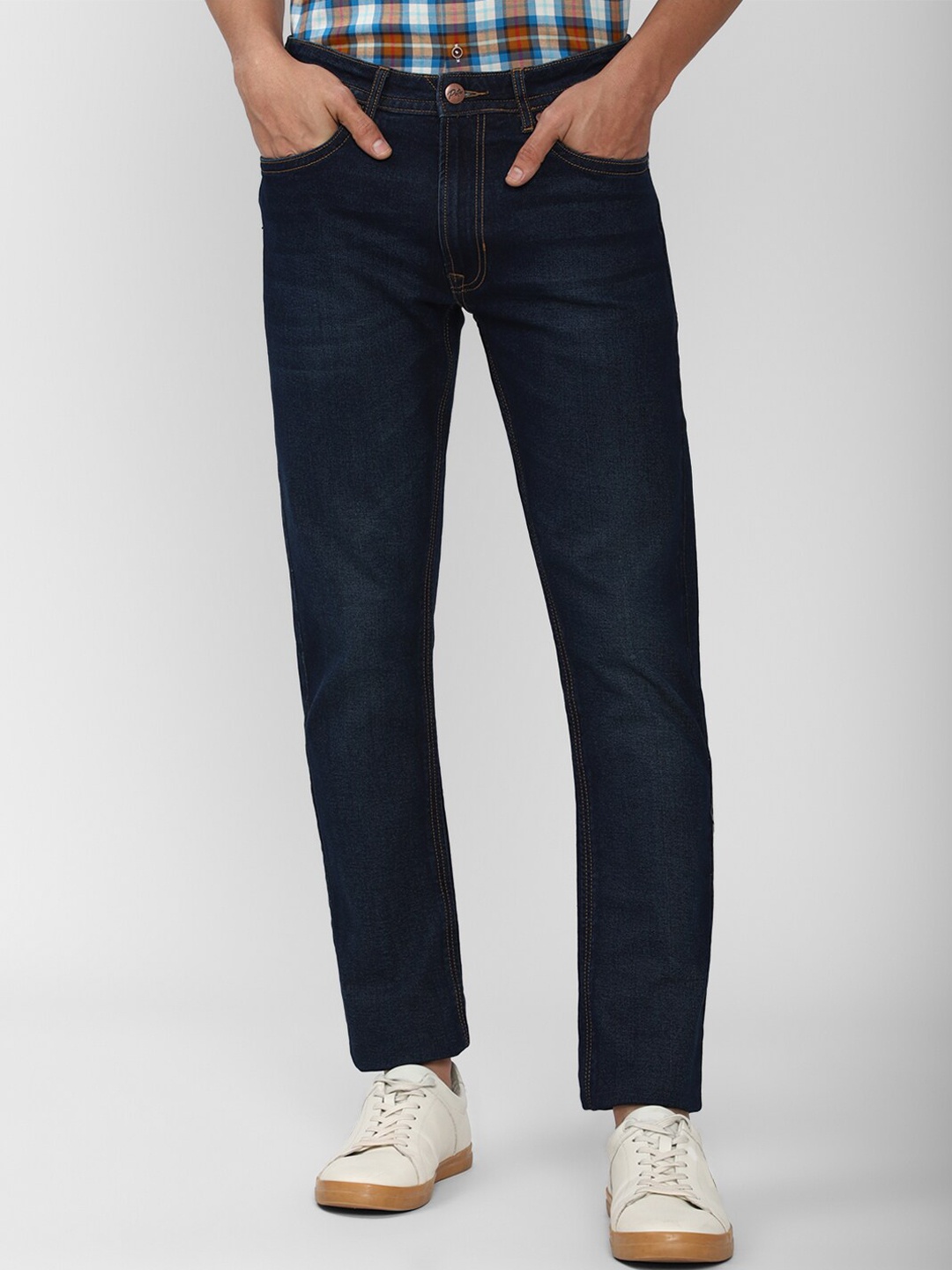 

Peter England Casuals Men Navy Blue Light Fade Jeans