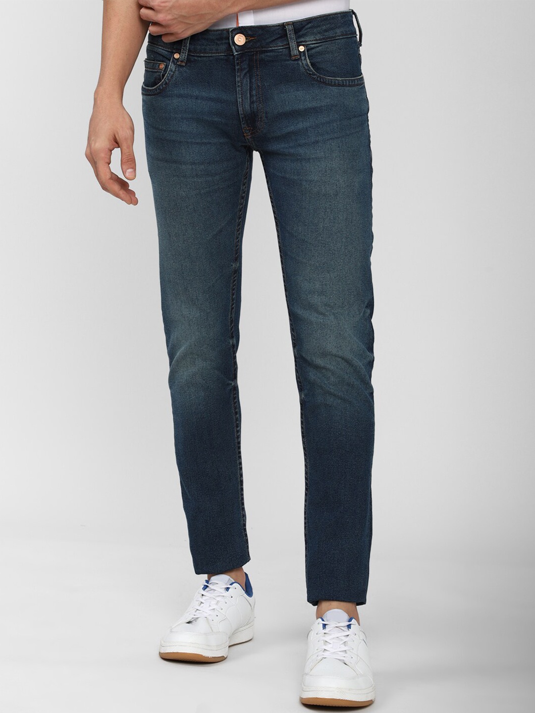 

Peter England Casuals Men Navy Blue Heavy Fade Jeans