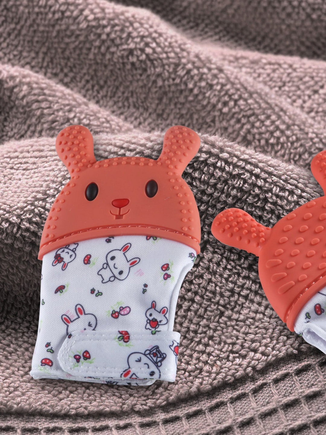

Baby Moo Kids Orange & White Printed Teething Self Soothing Glove
