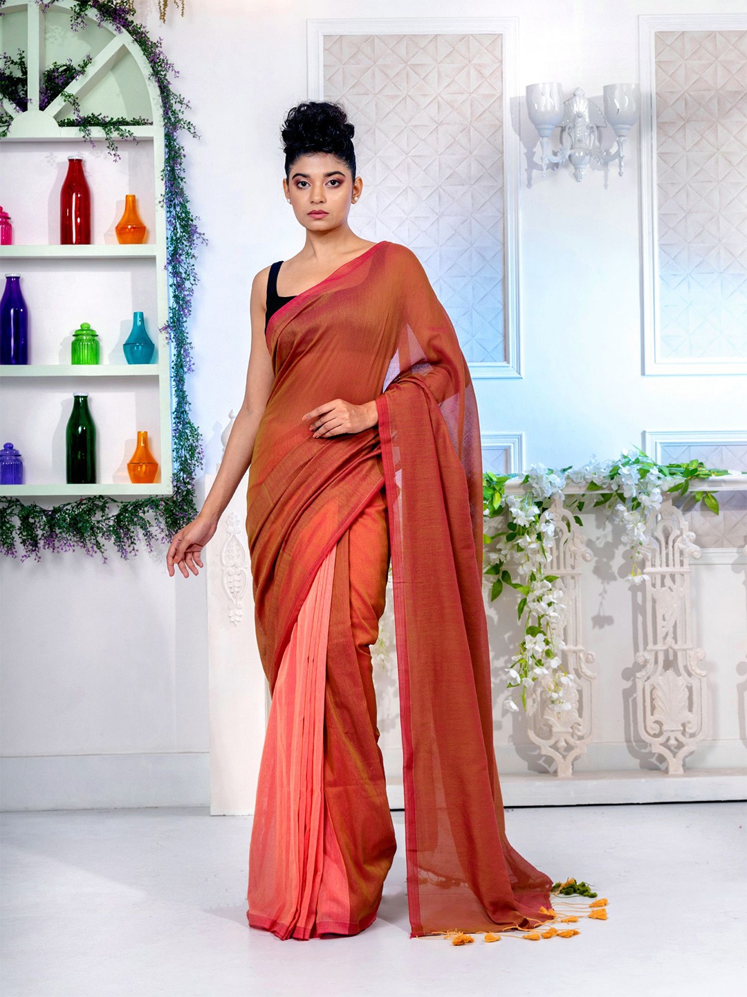 

Charukriti Women Peach Sarees