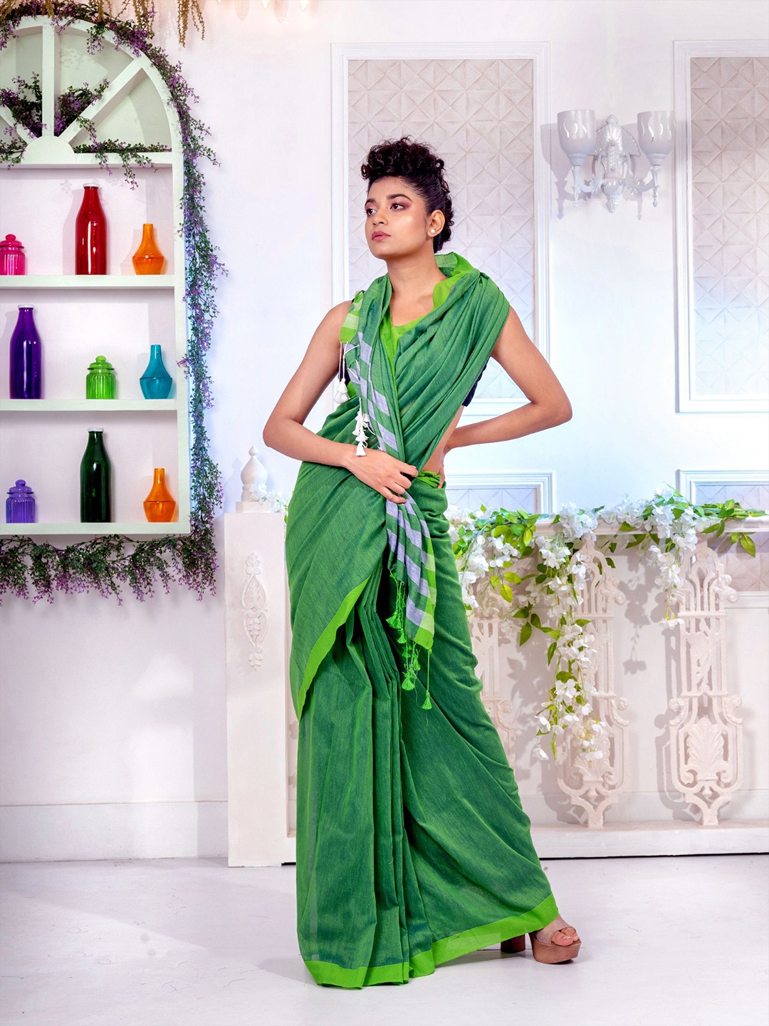 

Charukriti Women Green Sarees