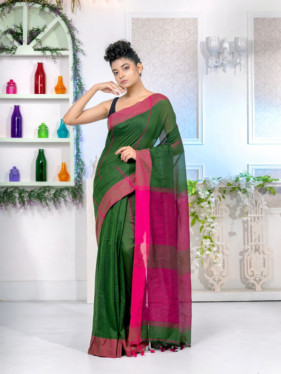 

Charukriti Women Green Sarees