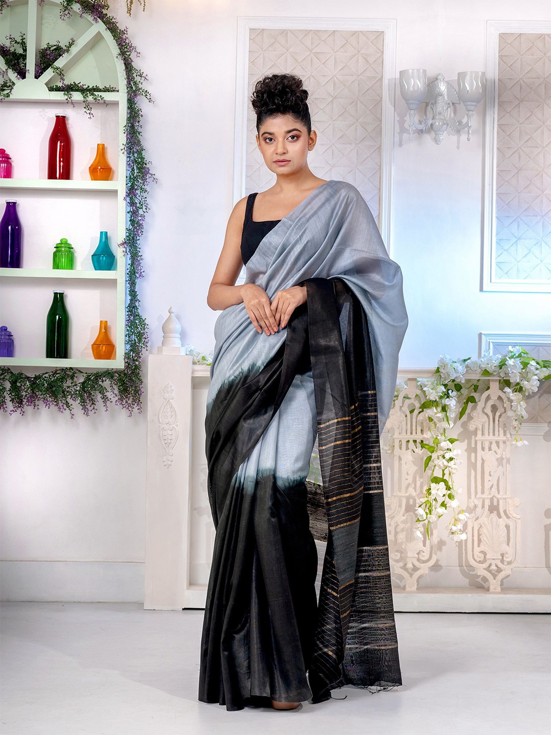 

Charukriti Women Grey Sarees