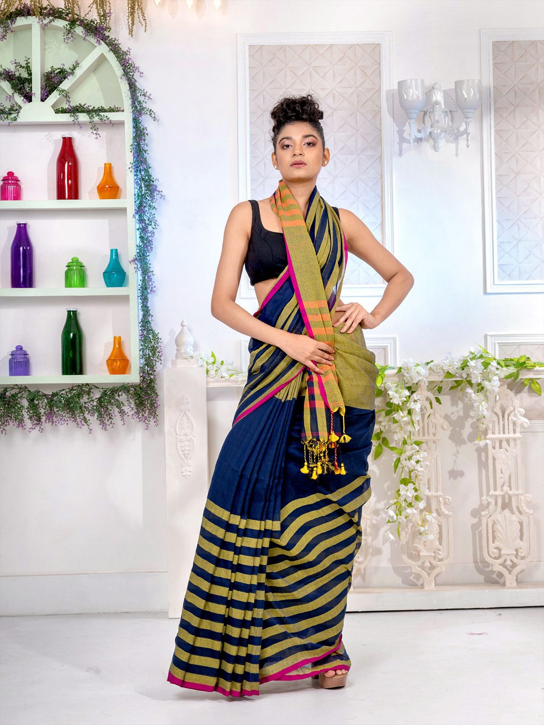 

Charukriti Women Blue Sarees