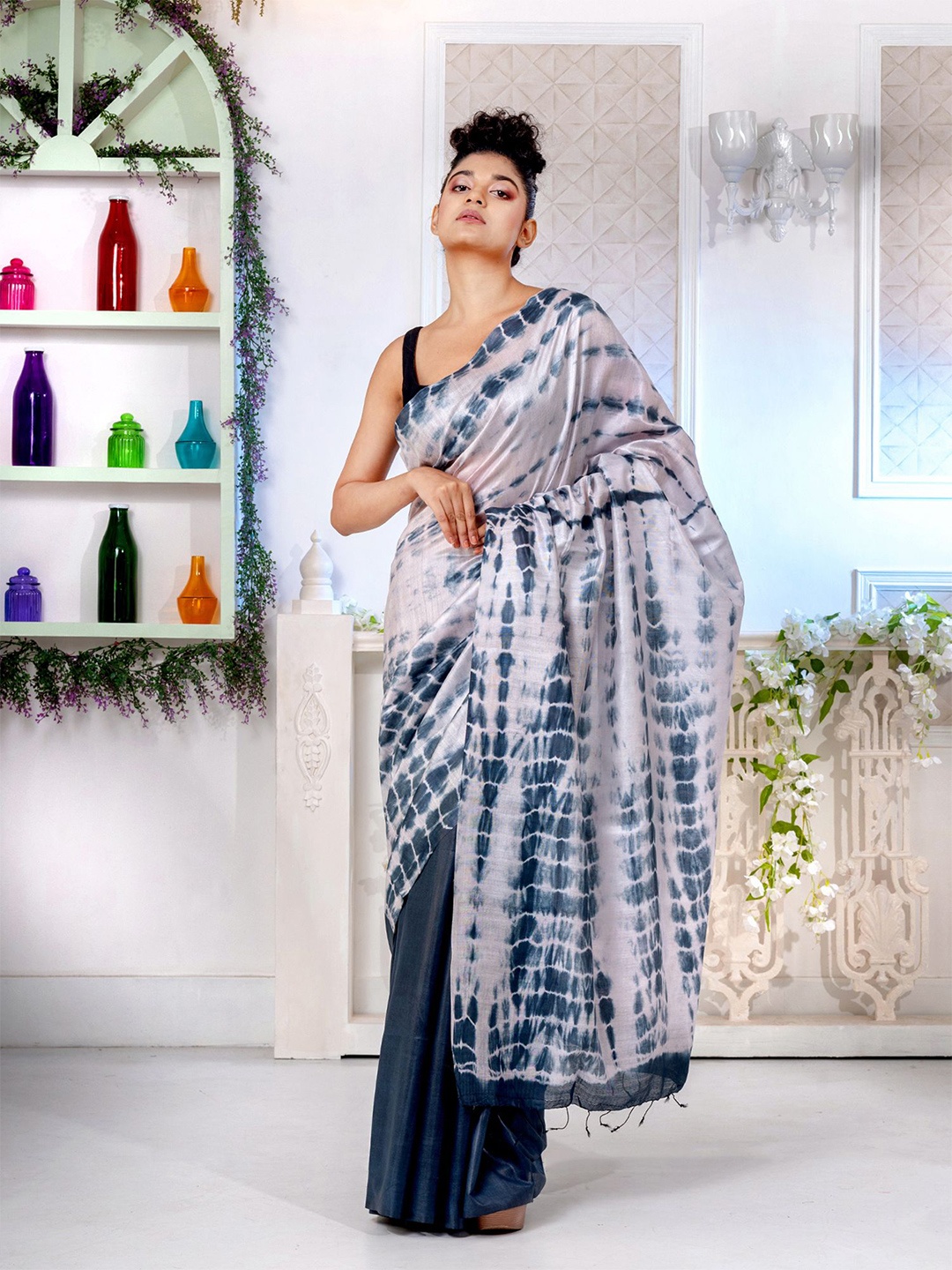 

Charukriti Women Teal Sarees
