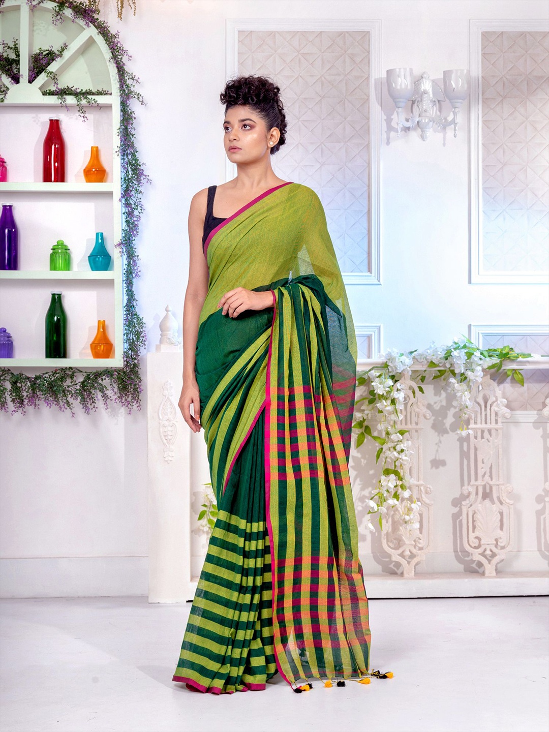 

Charukriti Women Green Sarees