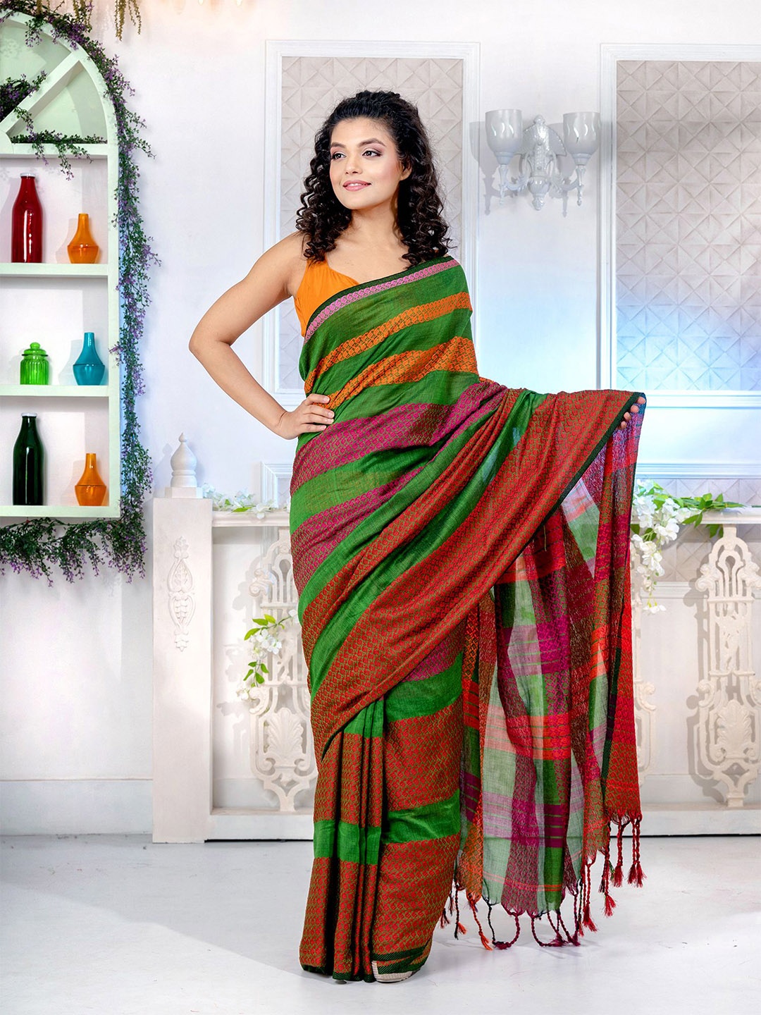 

Charukriti Women Green Sarees