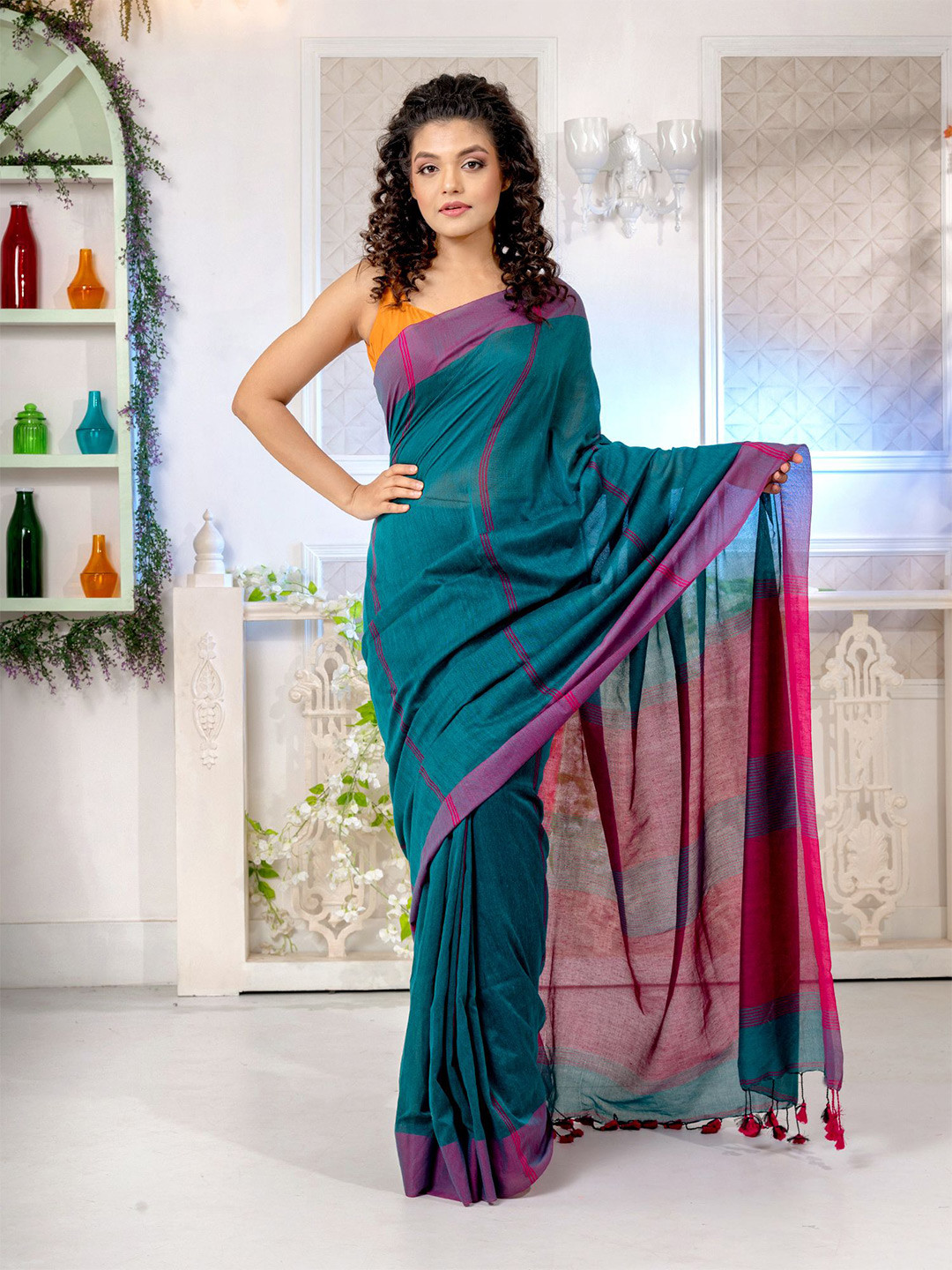

Charukriti Women Green Sarees