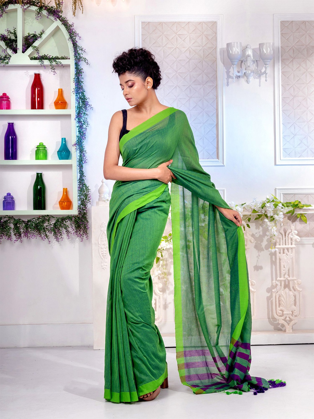 

Charukriti Women Green Sarees