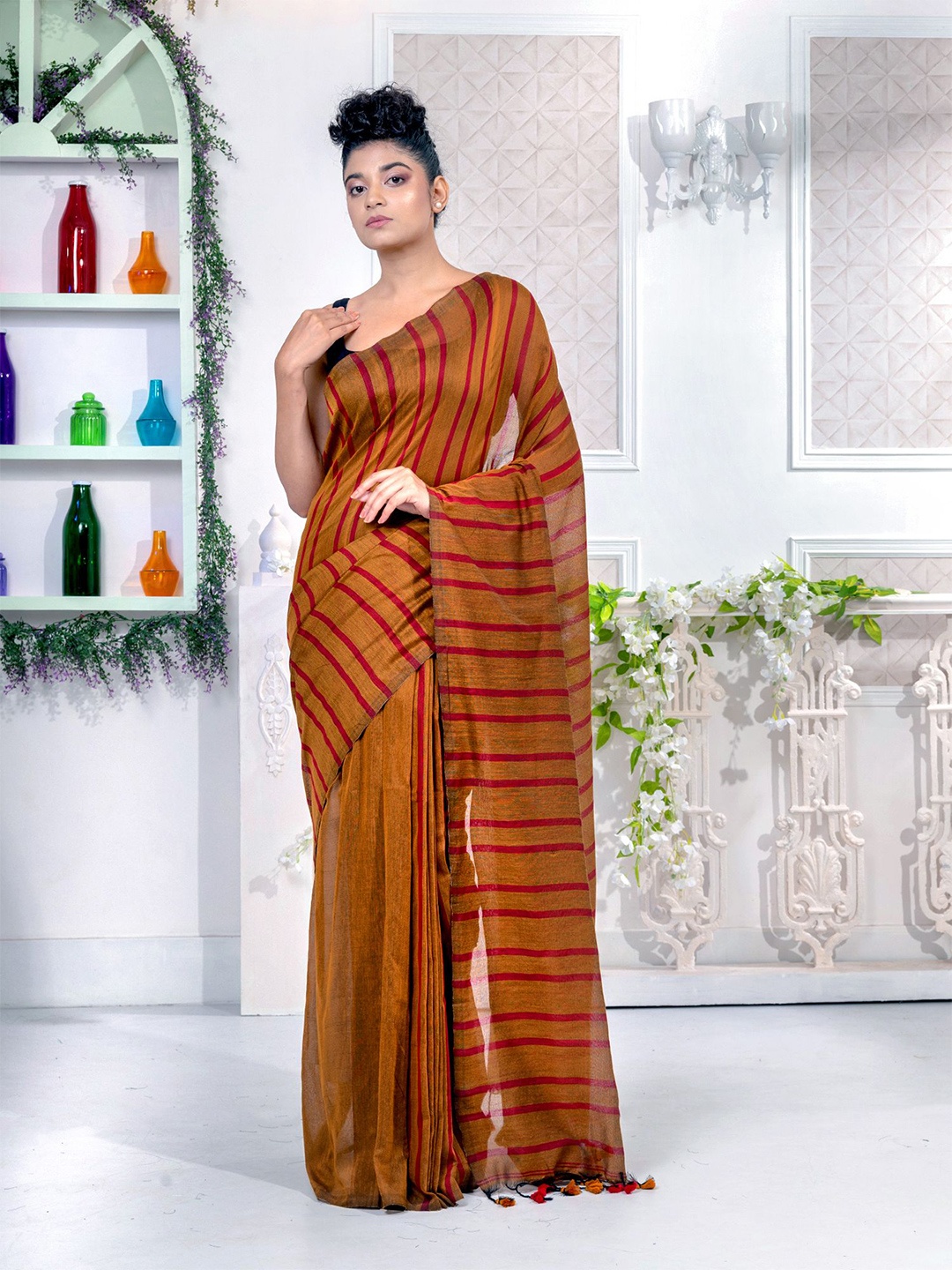 

Charukriti Women Mustard Sarees