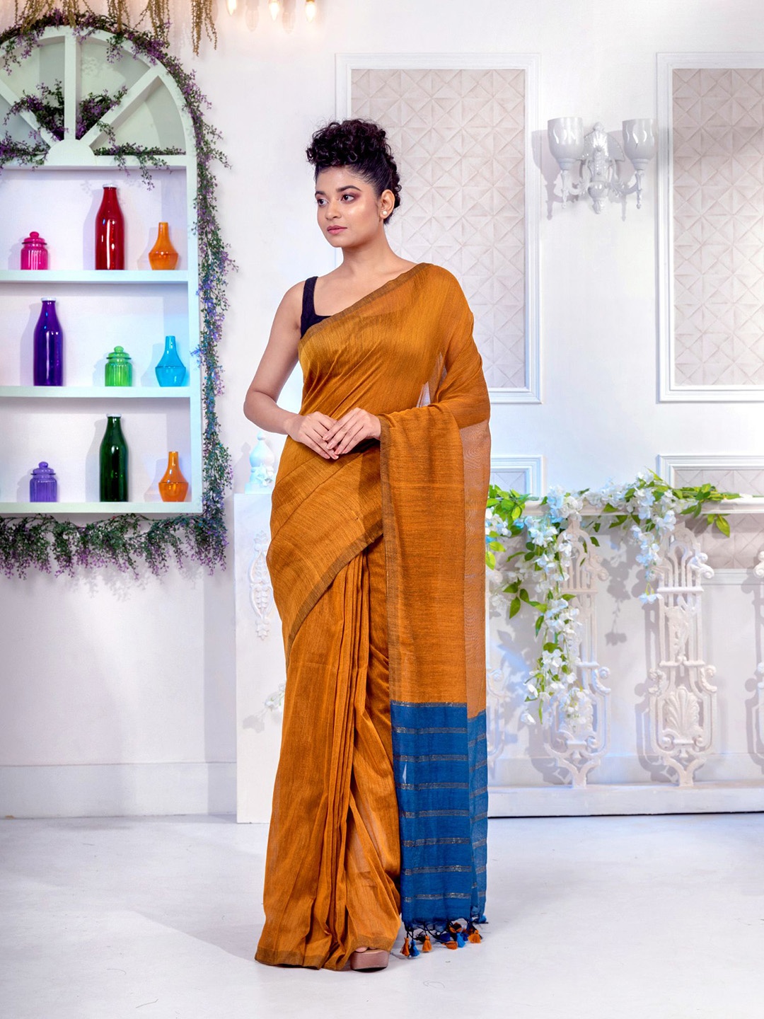

Charukriti Women Mustard Sarees