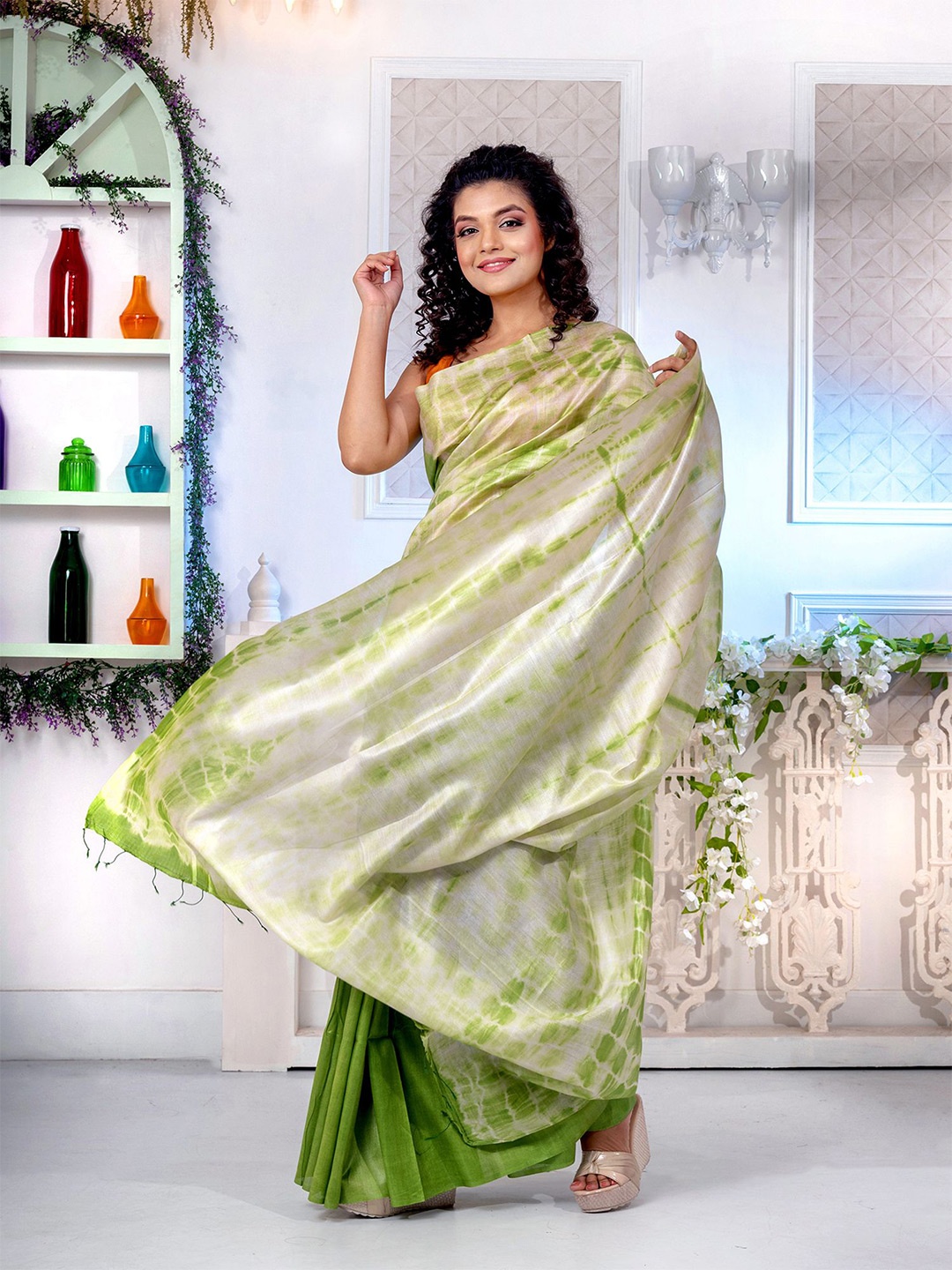 

Charukriti Women Green Sarees