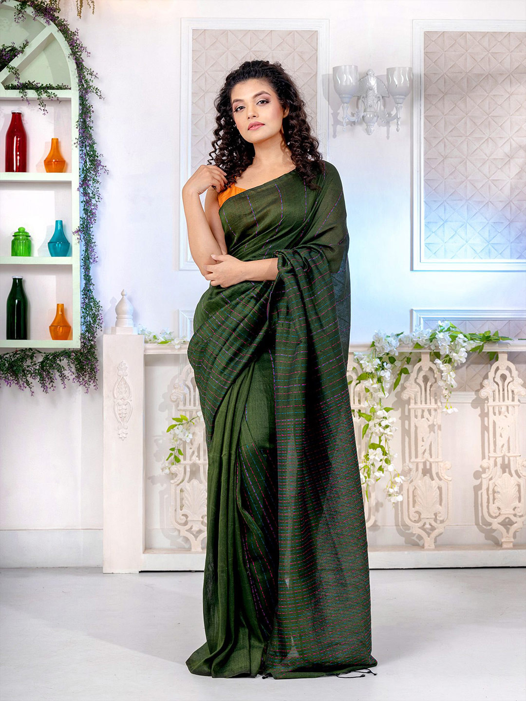 

Charukriti Women Green Sarees